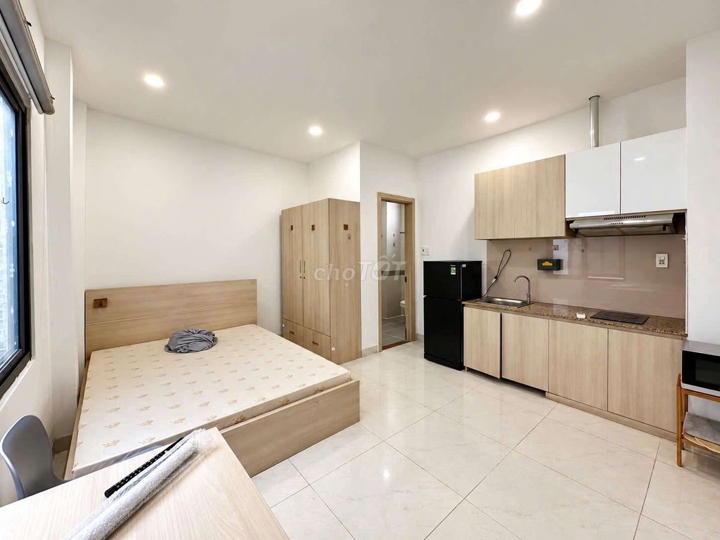 The sky window studio is full of furniture with elevators right in the center of the 10th district.