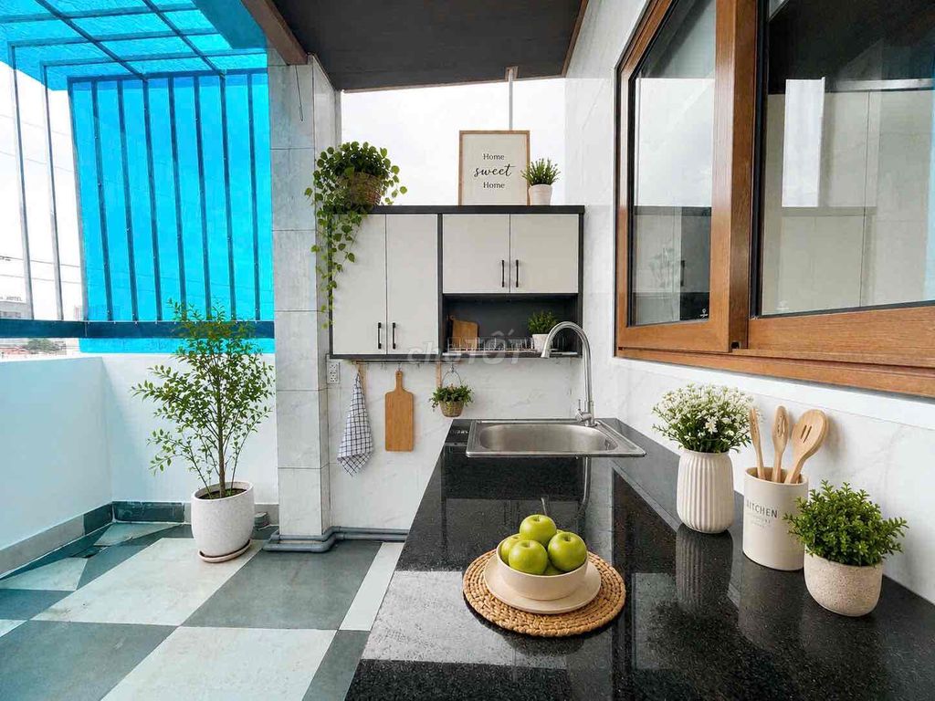 available balcony studio - full interior - kitchen split