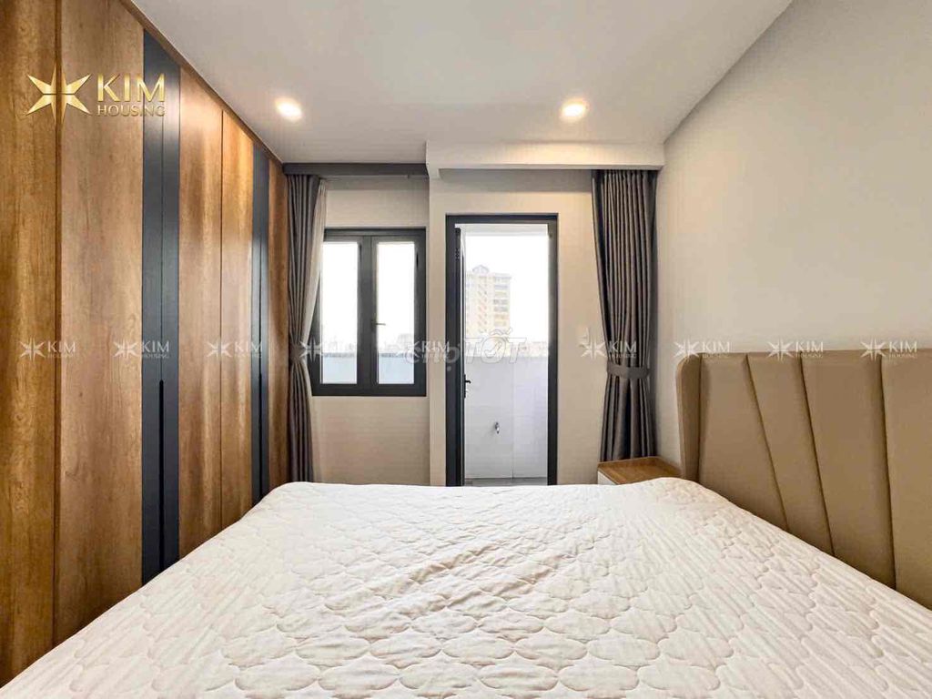 One bedroom tone wood be lit - wide - near the three-bar bridge, District 1