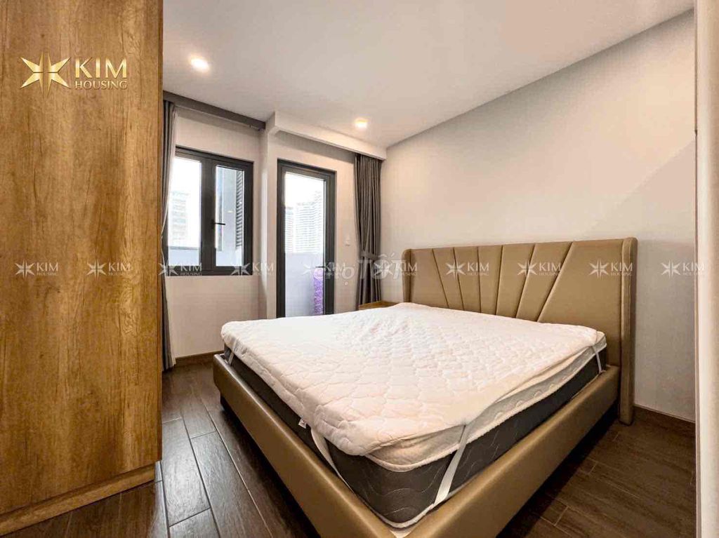 One bedroom tone wood be lit - wide - near the three-bar bridge, District 1
