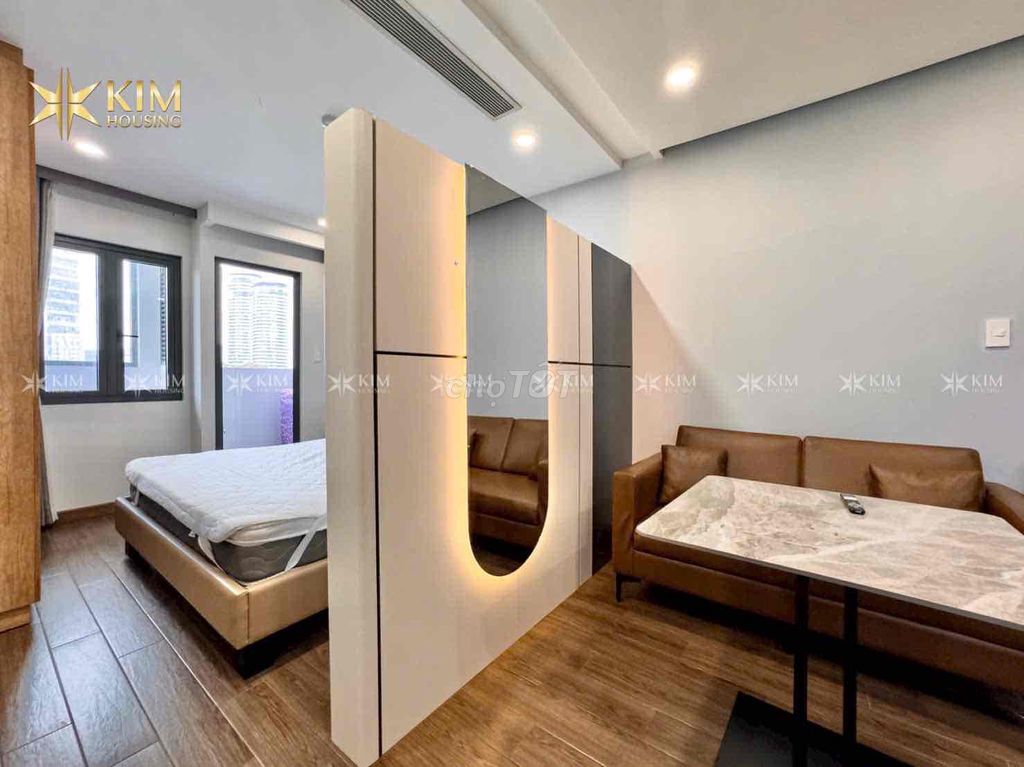One bedroom tone wood be lit - wide - near the three-bar bridge, District 1