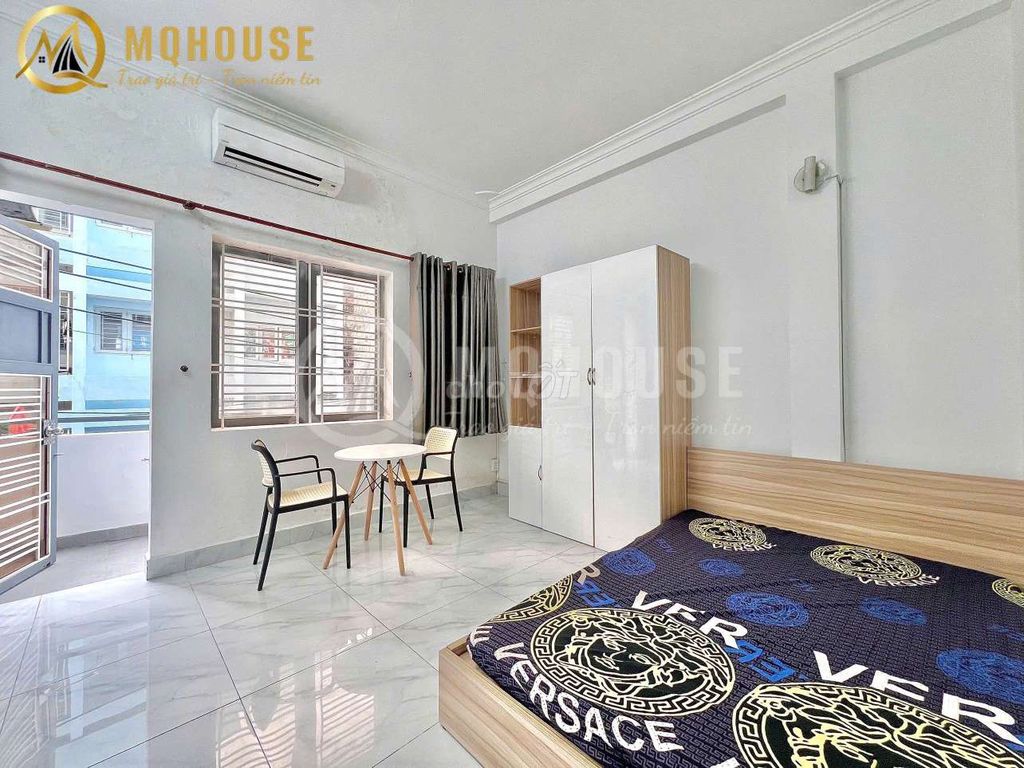 The 1st House, the balcony, splits the kitchen at 4 Phú Nhuận.