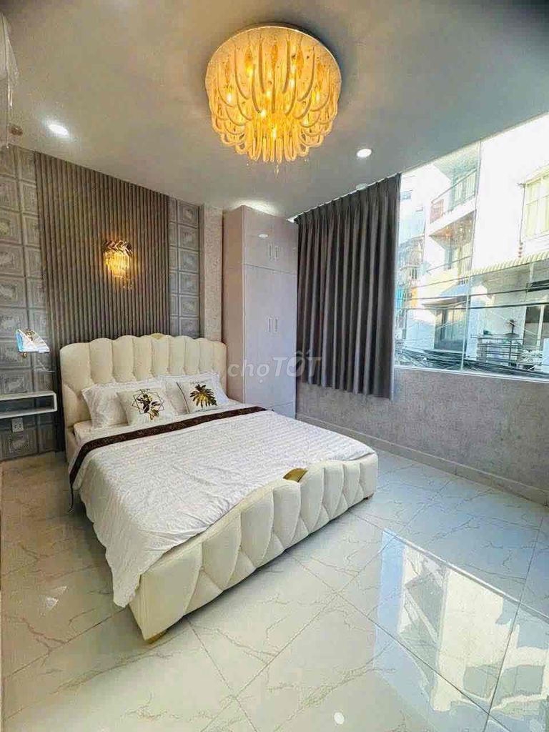 A nice two-story, two-room, three-room toilet, 4 x 8 meters, a Duy Tân.