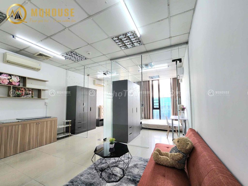 Two bedrooms one room. Full glass with curtains.