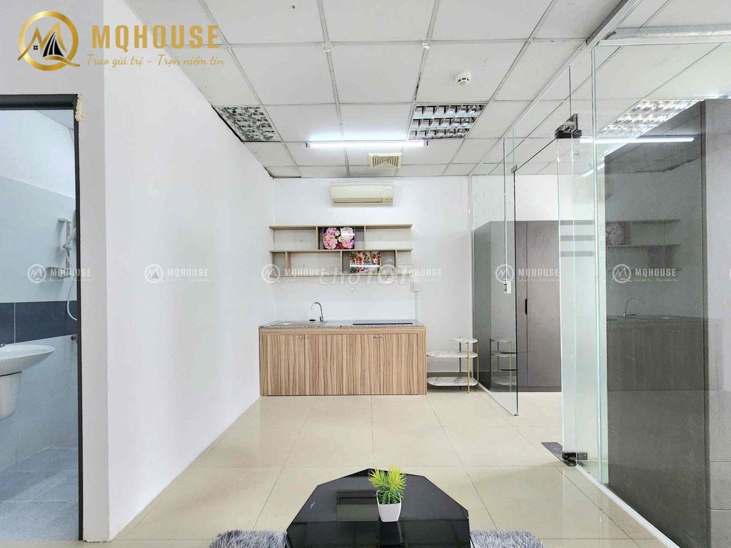 Two bedrooms one room. Full glass with curtains.