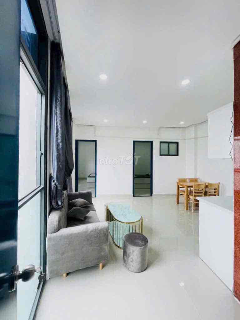 Two bedrooms on the road near a soft bridge.