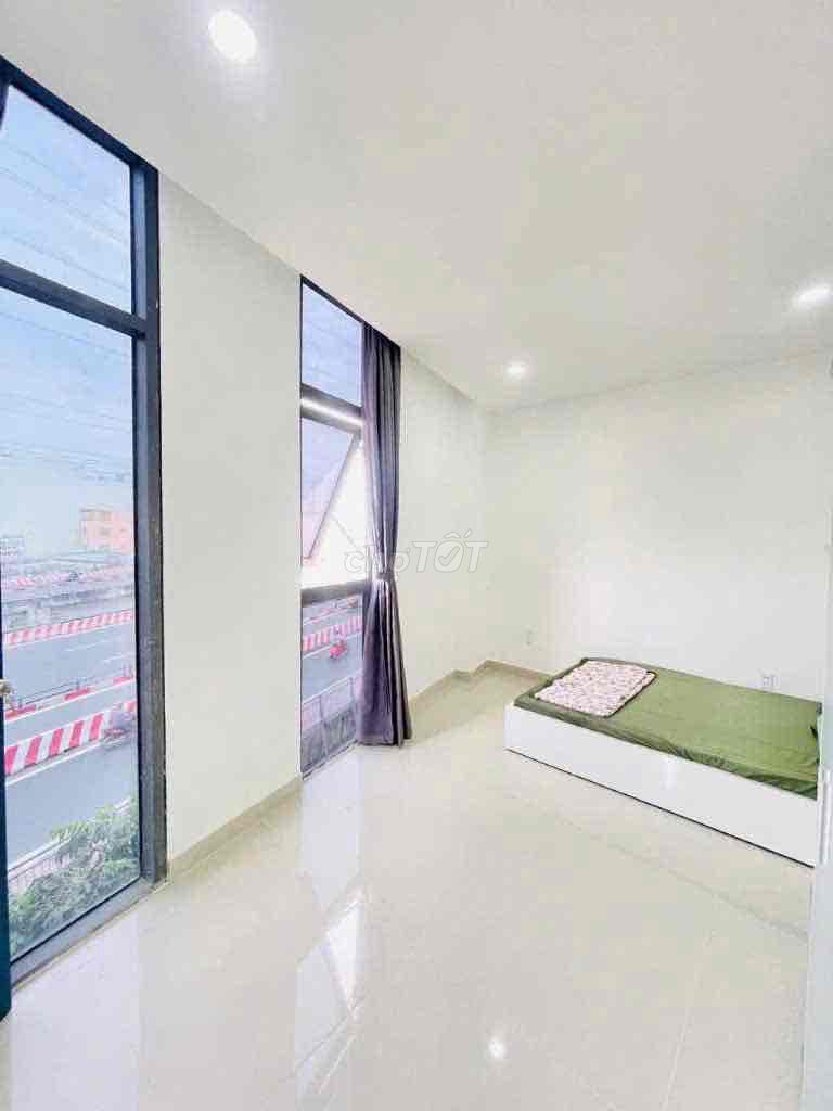 Two bedrooms on the road near a soft bridge.