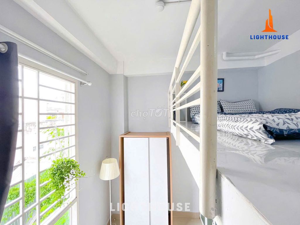 The nice clean apartment is in the market. The lady has the elevator.