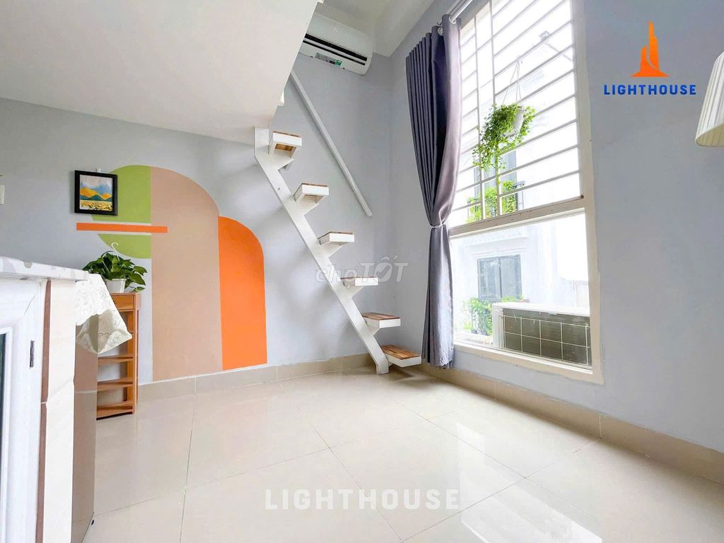 The nice clean apartment is in the market. The lady has the elevator.