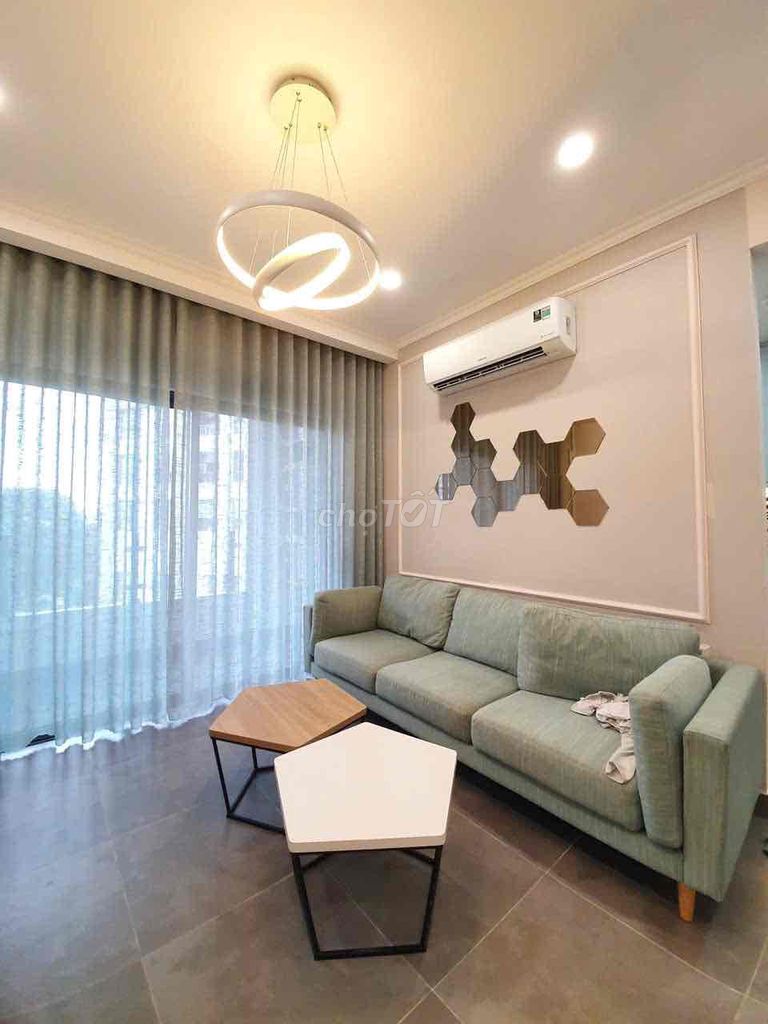 High school apartment 3 bedroom with a car coming out next to airport park.