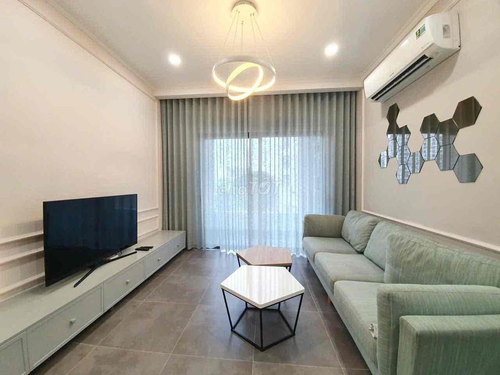 High school apartment 3 bedroom with a car coming out next to airport park.