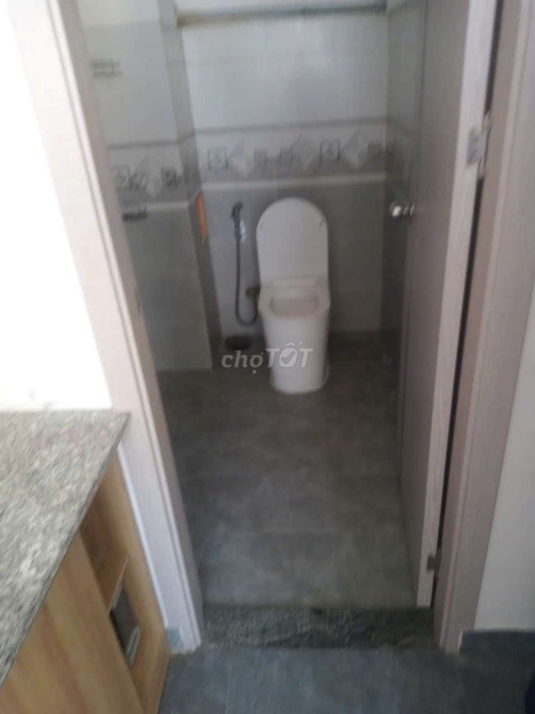 The room is wide, private toilet, full interior.