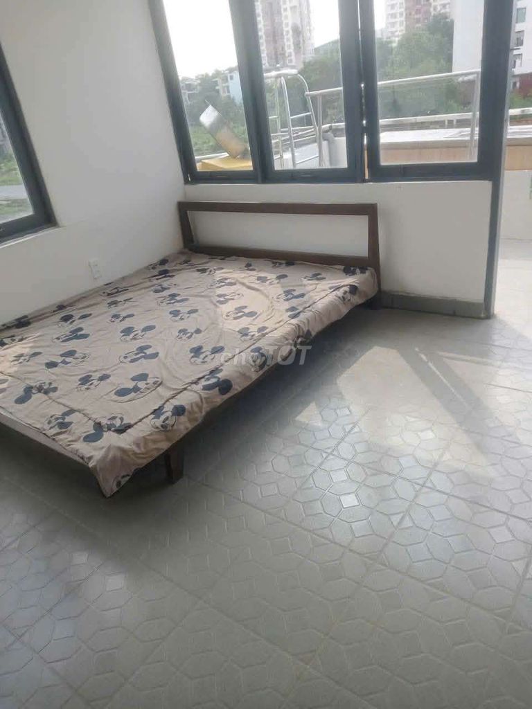The room is wide, private toilet, full interior.