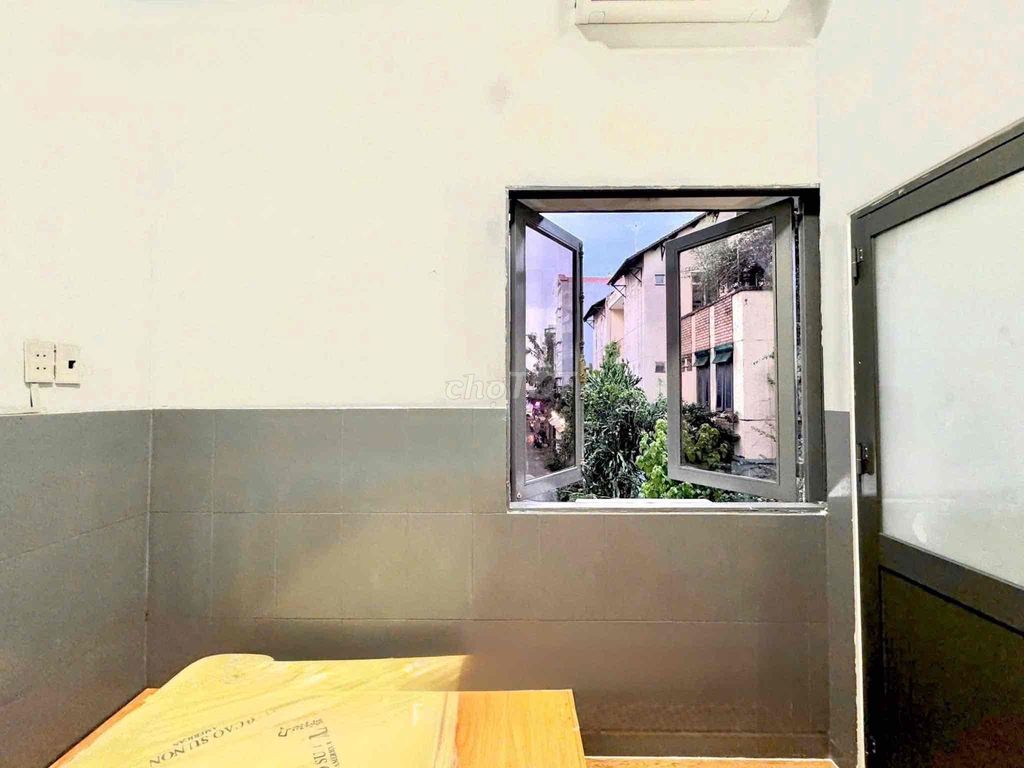 Room 2 sleep space, open window, full interior near the Constitution
