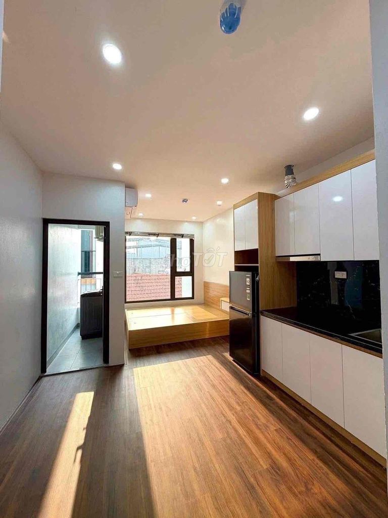 The studio is full of furniture, a cool, wide balcony at the center of 7th.
