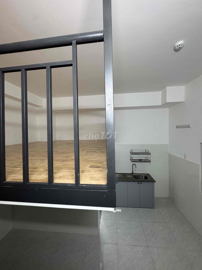 The new room is three people, a few feet behind Lang University.