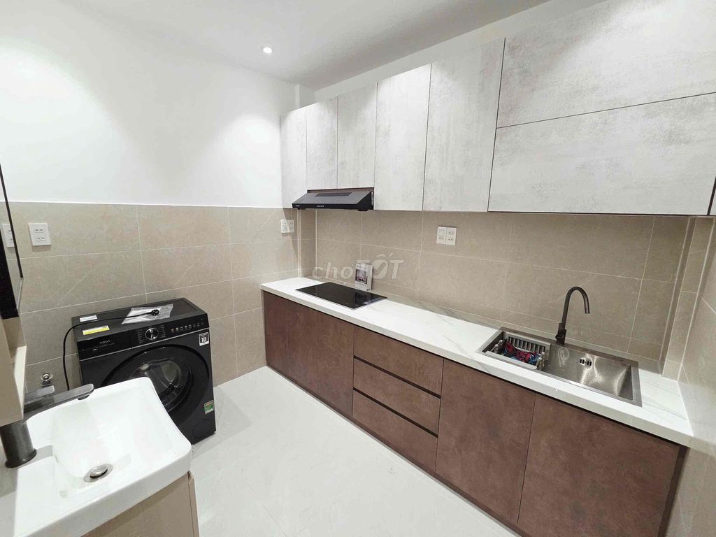 The original two bedrooms are full of furniture - ground one floor