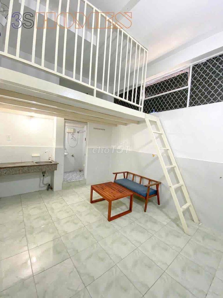 mini apartment has an elevator guard in the front of Tân Bình vhu and halt
