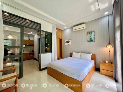 The apartment is empty. A super cool bedroom. Lots of green trees, private washing machines.
