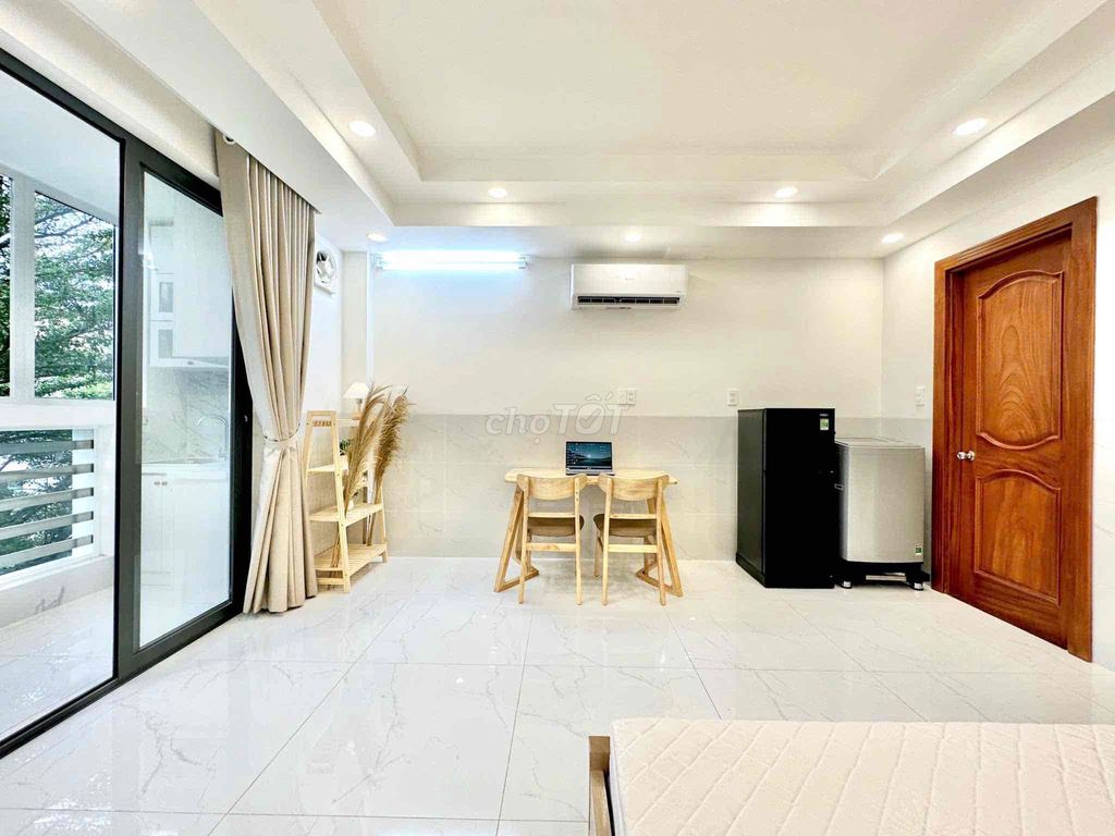 The open-cost balcony studio, full interior -- right in the middle of the 7th district.