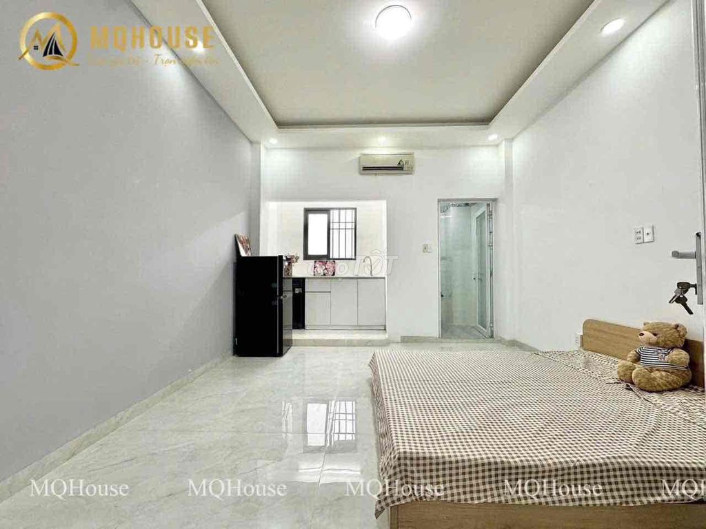 The top apartment is full of furniture near a ten-year-old shower in 11th districts.