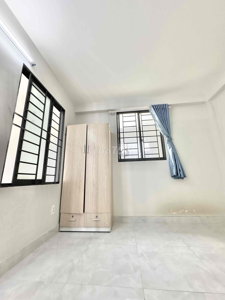 A clear, private rooftop suite at 116/46 Dương Quảng Hàm.