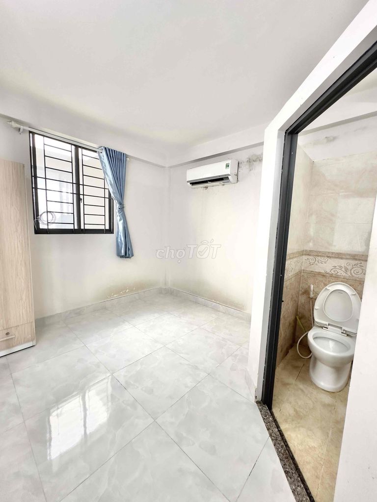 A clear, private rooftop suite at 116/46 Dương Quảng Hàm.