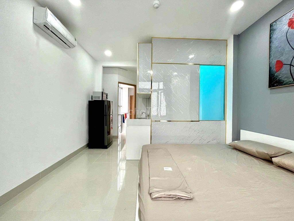 Studio - Lê Văn Sỹ Front, elevator building, kitchen split