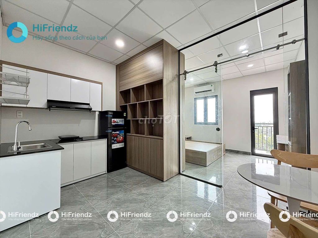 A high-end bedroom with separate washing machines.
