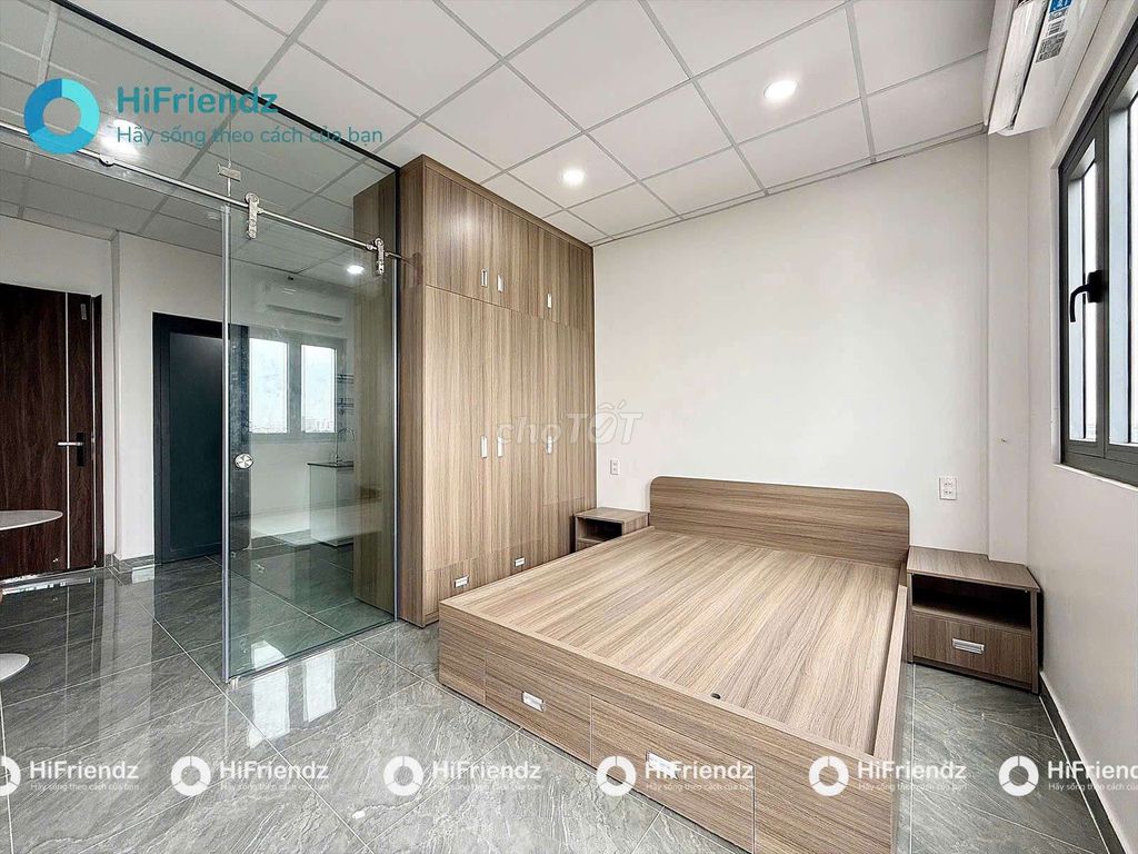 A high-end bedroom with separate washing machines.