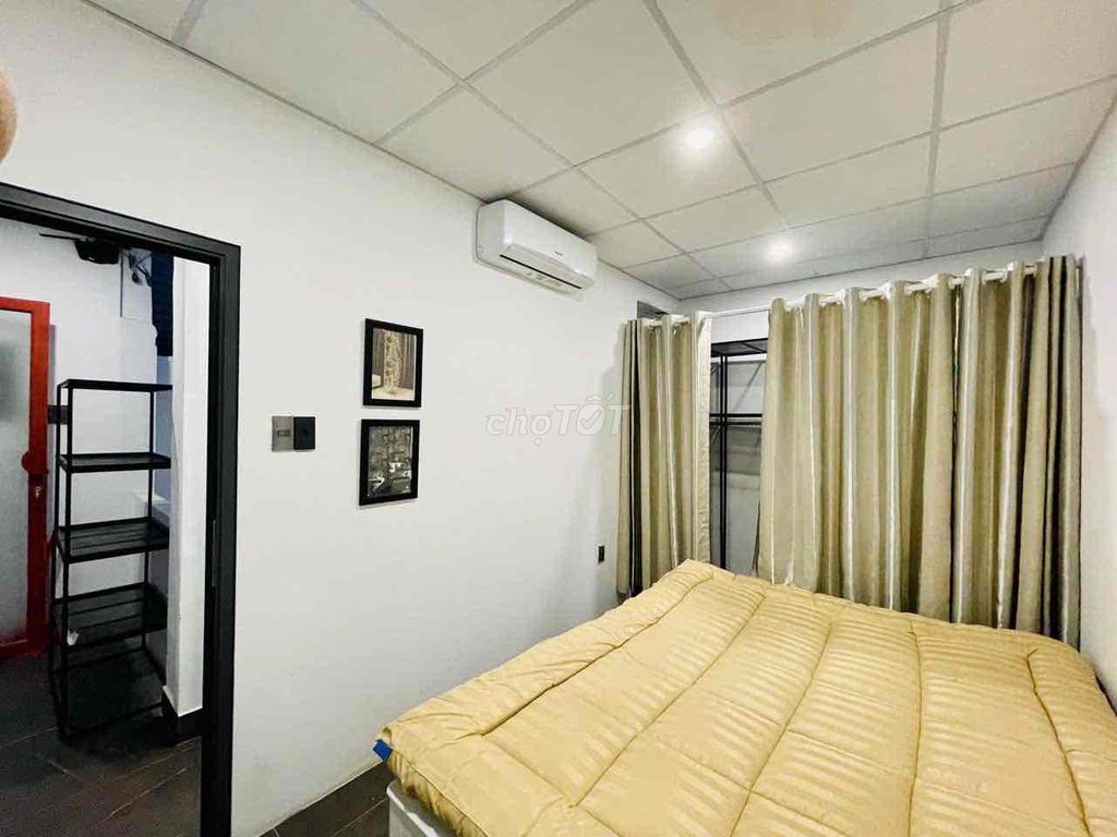Two bedrooms with a balcony living room.