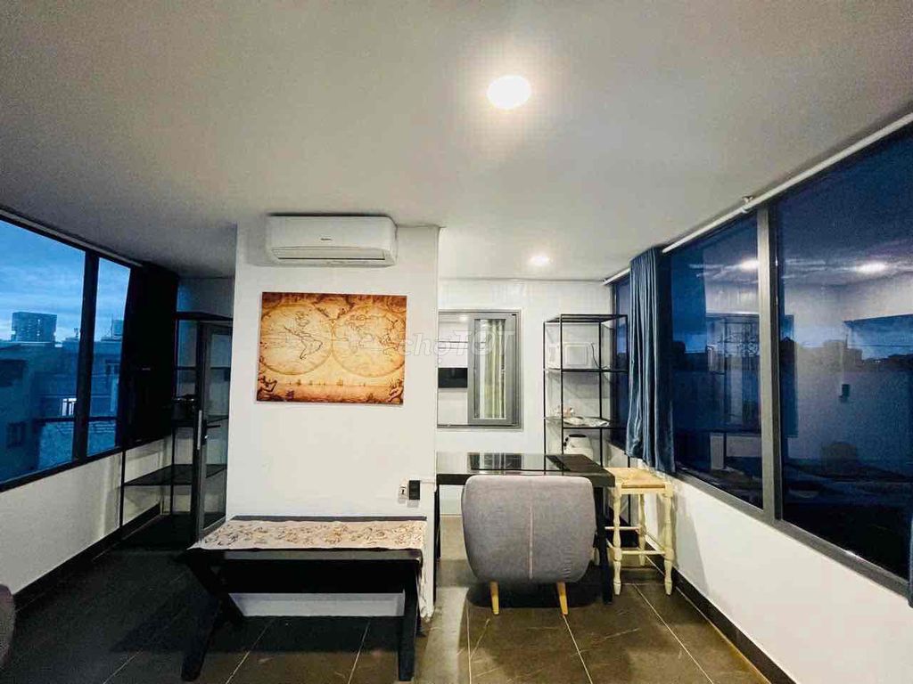 Two bedrooms with a balcony living room.