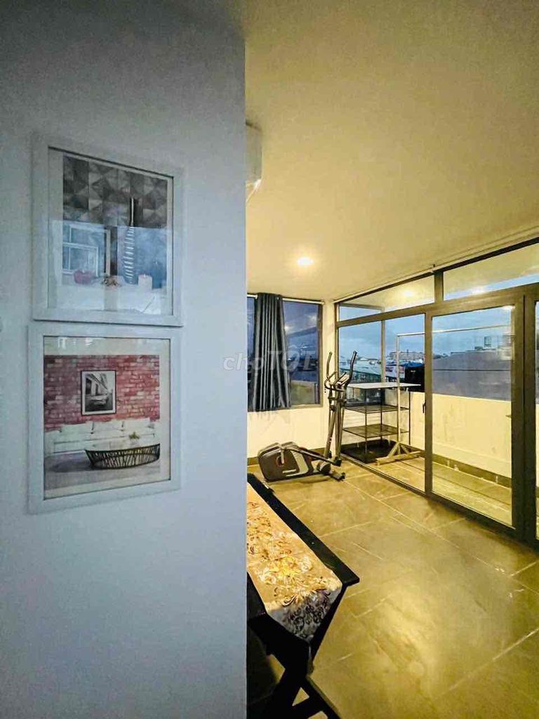 Two bedrooms with a balcony living room.