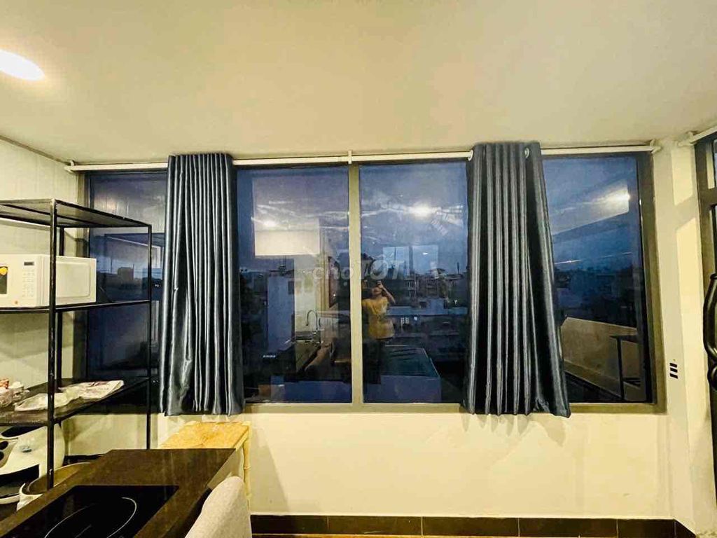Two bedrooms with a balcony living room.
