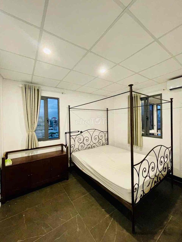 Two bedrooms with a balcony living room.