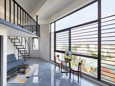 The service apartment has a balcony full of furniture downtown in District 7