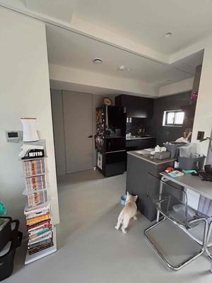 The kitchen room is full of furniture downtown in District 7.