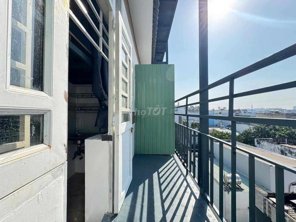 It's the owner of the Lê Trọng Tấn Hotel with the balcony