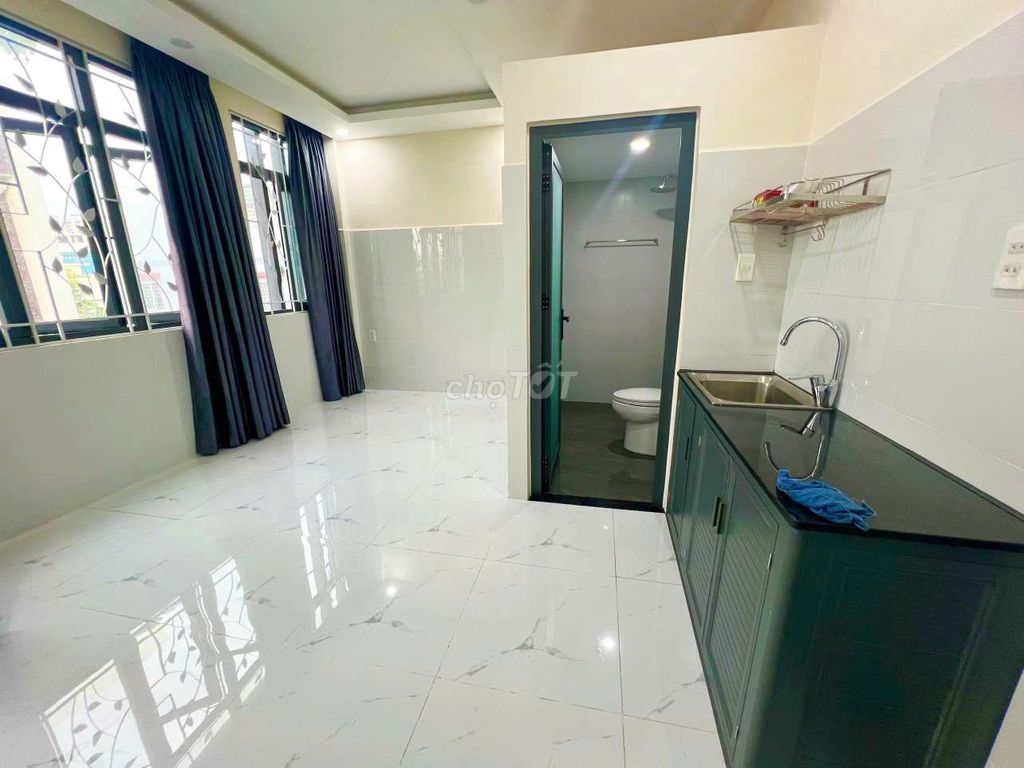 Super-new balcony studio right near the American toilet.