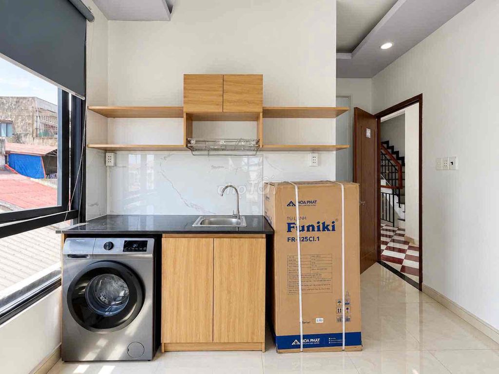 Just 100 percent of the interior room, big window, private washing machine-- District 5.