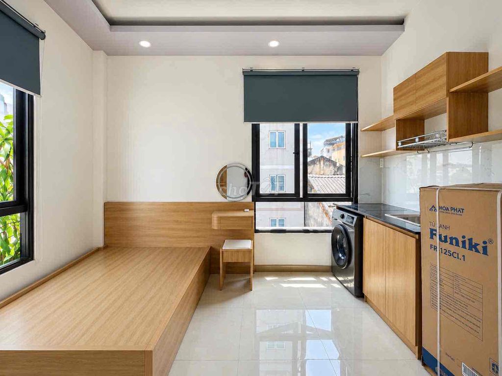 Just 100 percent of the interior room, big window, private washing machine-- District 5.