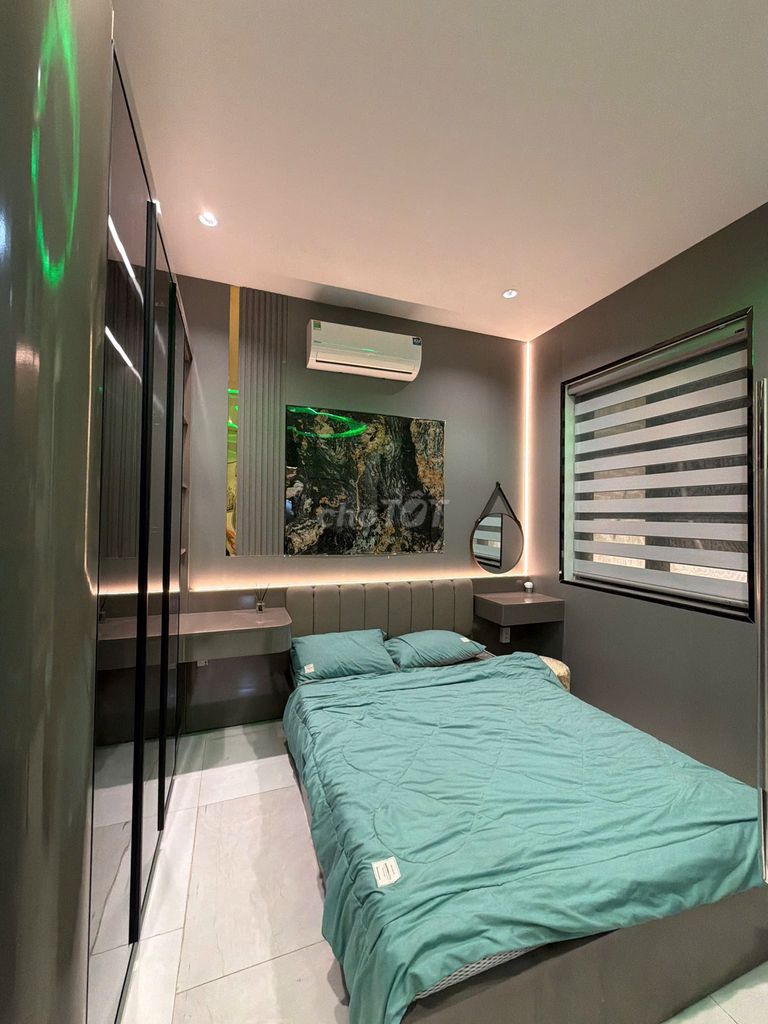 Cityland service apartment. One bedroom. One living room with a balcony.
