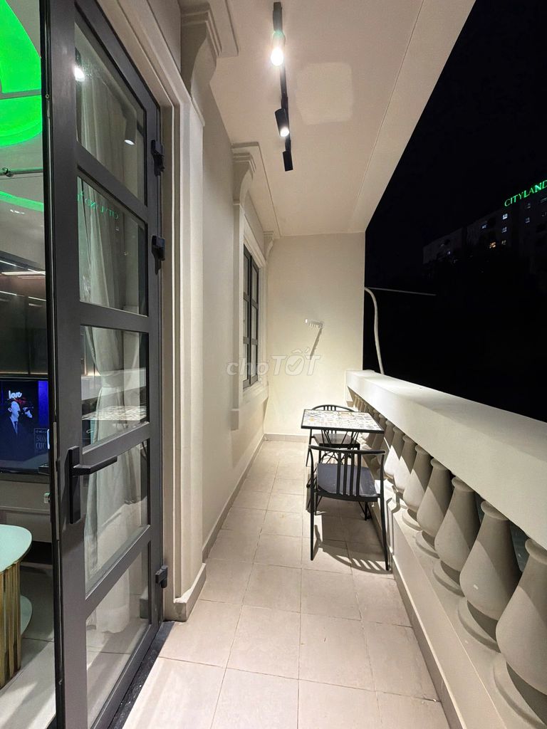 Cityland service apartment. One bedroom. One living room with a balcony.