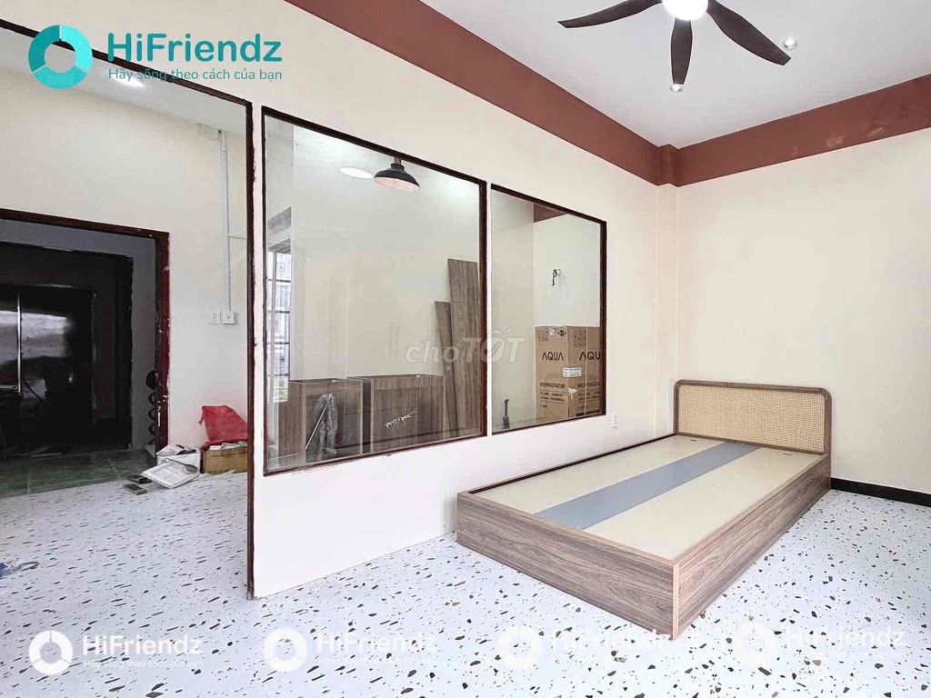 A living room. A full bedroom near a dedicated university.