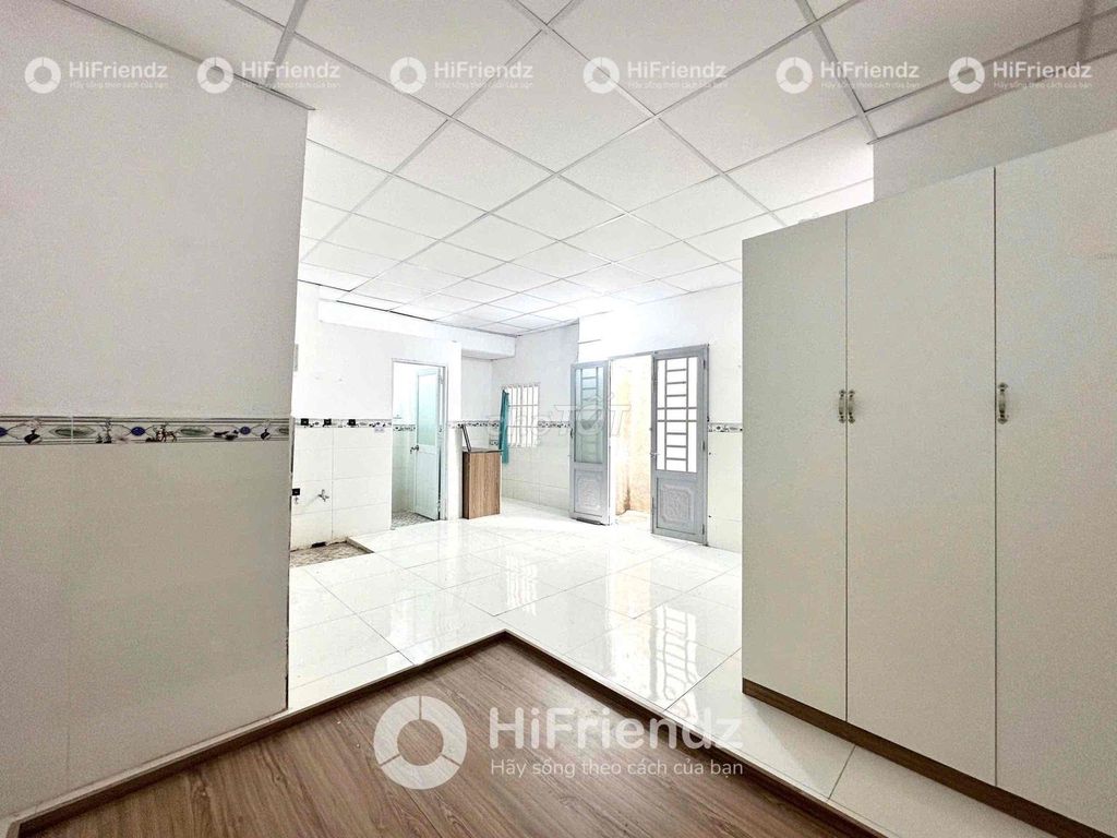 Nice clean lodging near the open doorroom.
