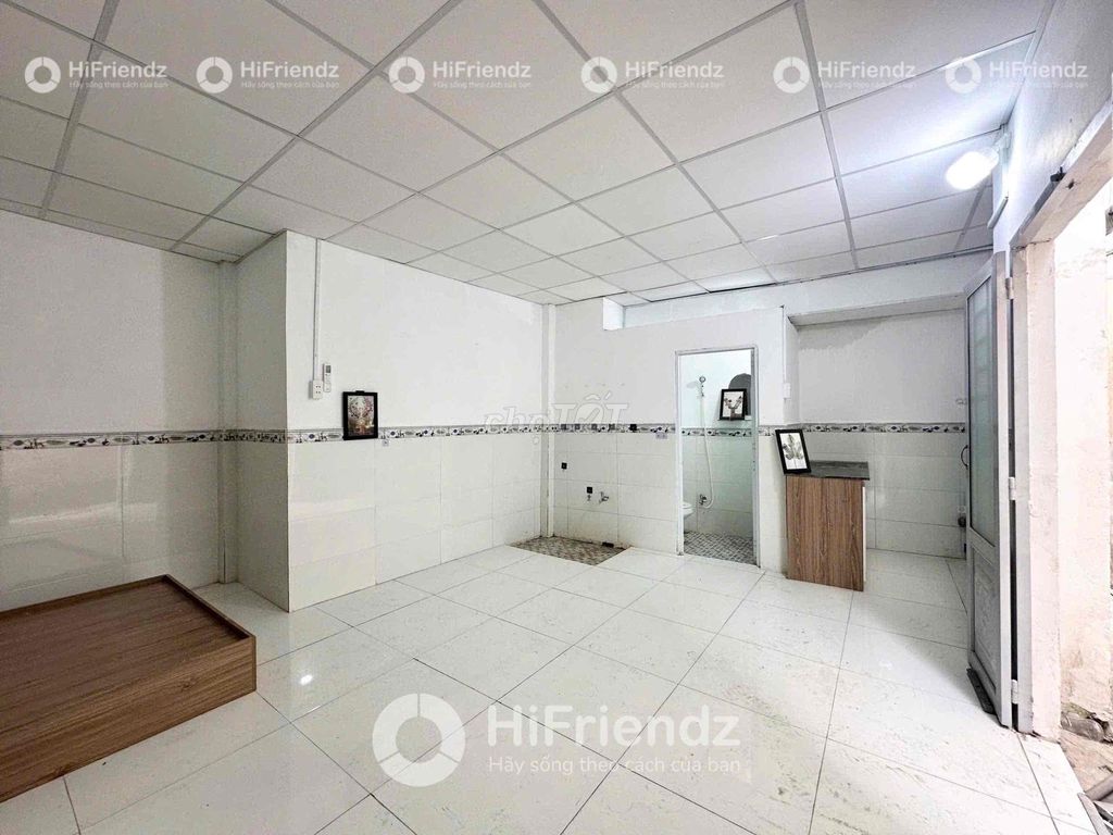 Nice clean lodging near the open doorroom.