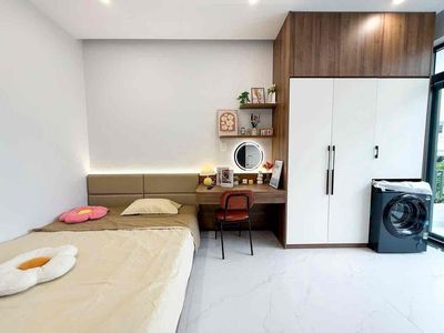 A beech studio -- right at Tân Bình -- commercial college.