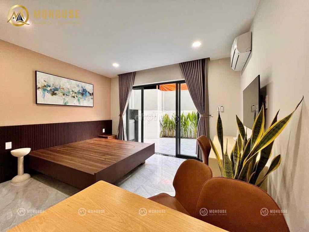 The penthouse balcony service room. A pan's got a whole modern set of furniture.