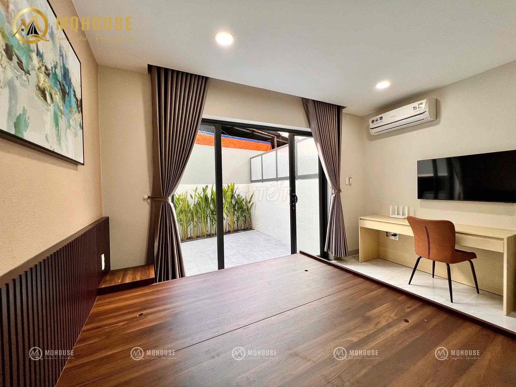 The penthouse balcony service room. A pan's got a whole modern set of furniture.