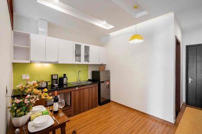 Bình Thạnh apartment, balcony -- 4 green rows right down.